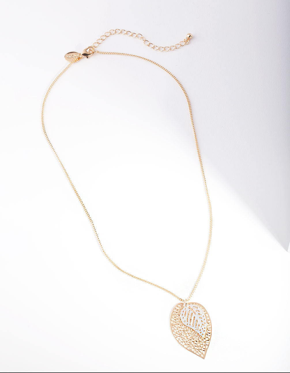 Mixed Metal Cutout Layer Leaf Necklace