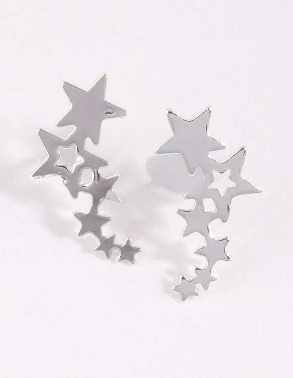 Showcasing silver star crawler earrings with celestial details front view