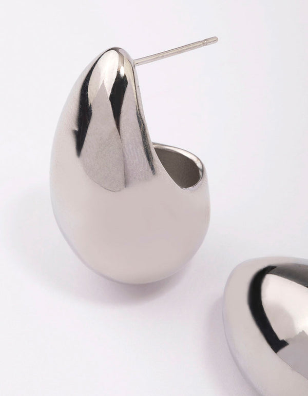 Featuring waterproof stainless steel large teardrop earrings in silver close up view