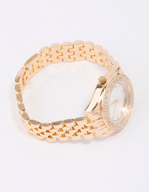 Discover this gold diamante encrusted watch with white dial featuring roman numerals, round shape, designed for women, formal occasions, analog type, and link band strap front view