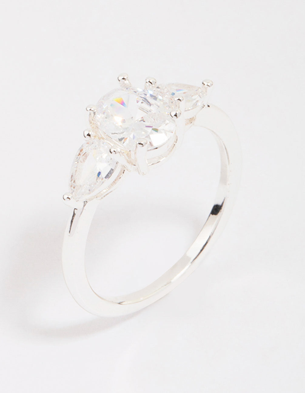 Elegant silver plated oval enchanting ring featuring stone cut detailing close up view
