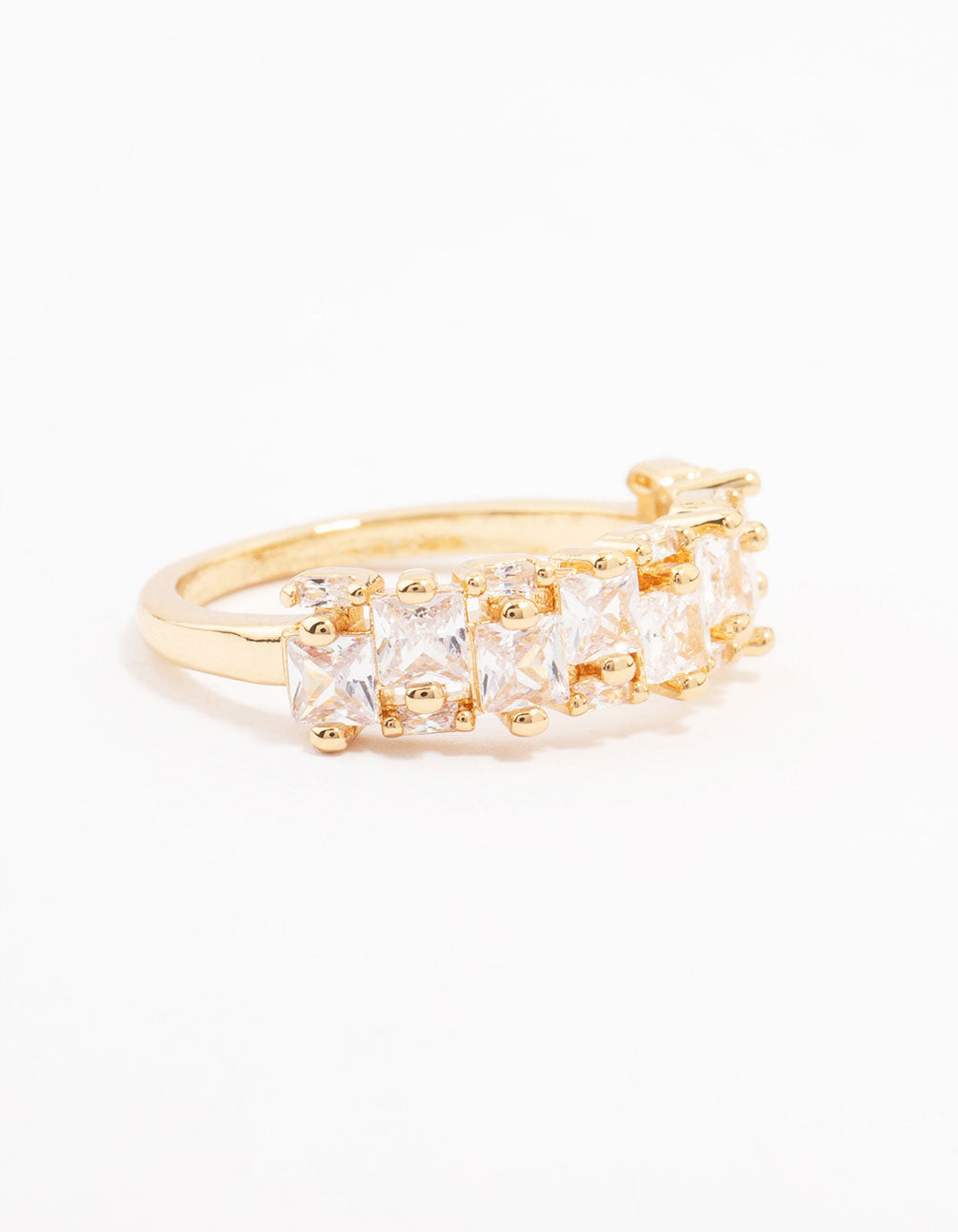 Showcasing a gold plated staggered cubic zirconia band ring with dainty design side detail view