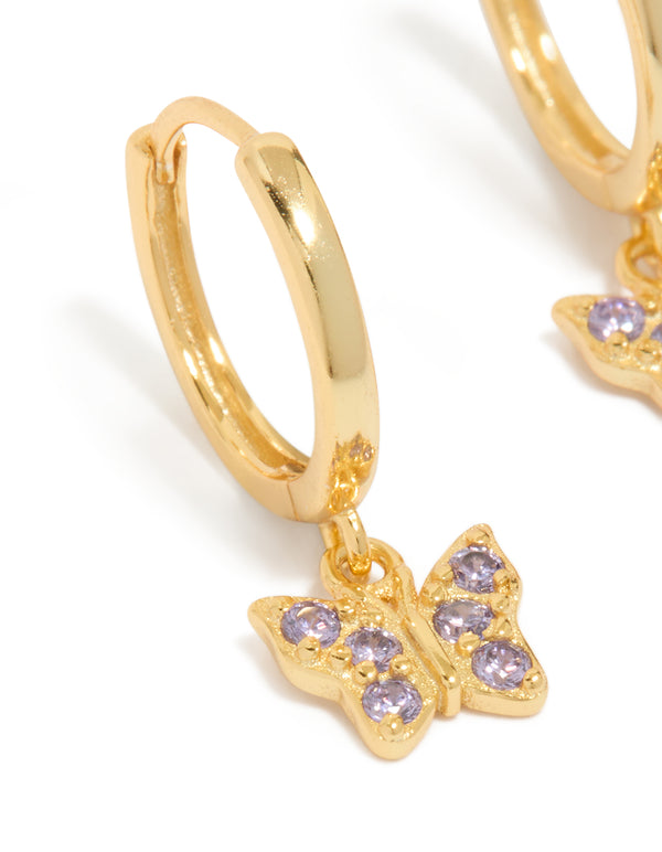 Highlighting gold plated sterling silver cubic zirconia butterfly earrings in purple close up view