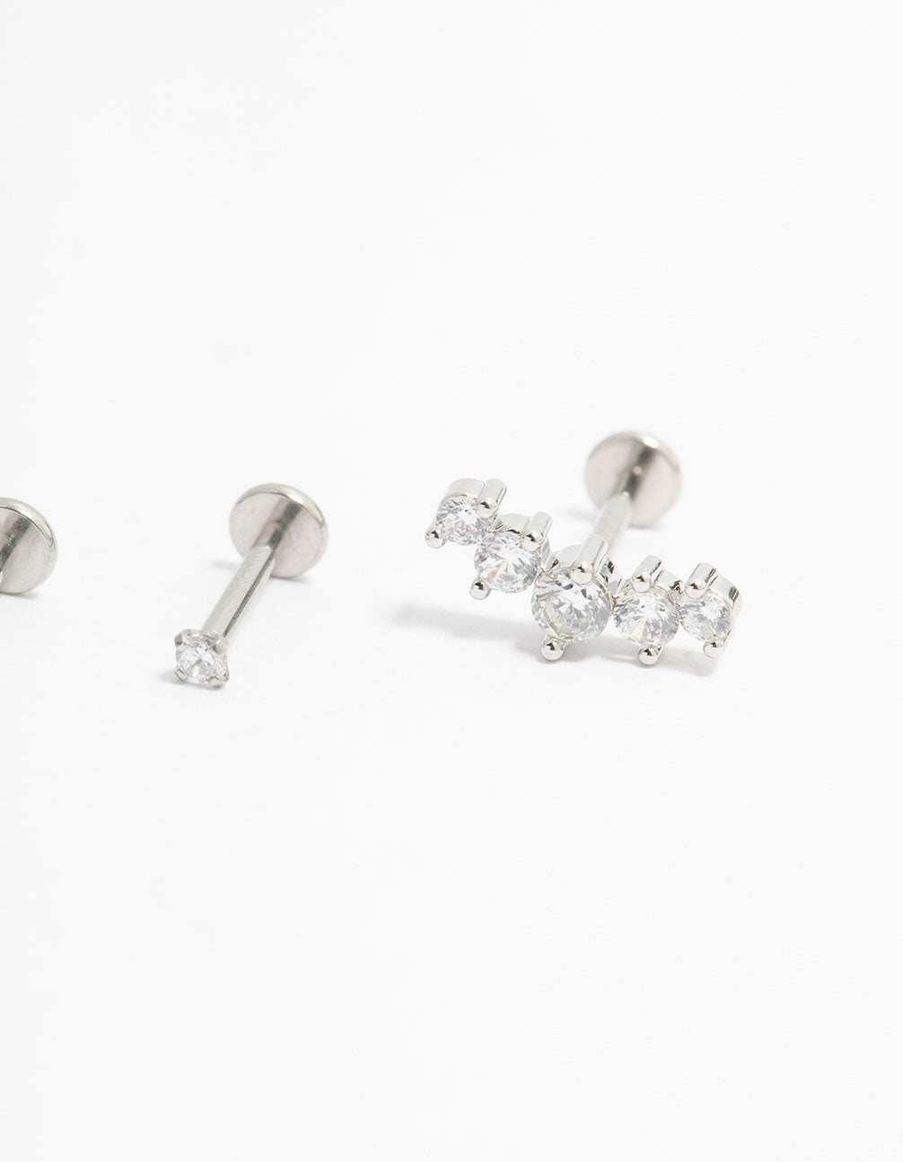 Showcasing surgical steel crawler flat back earrings with round cut stones in a 3-pack post detail view