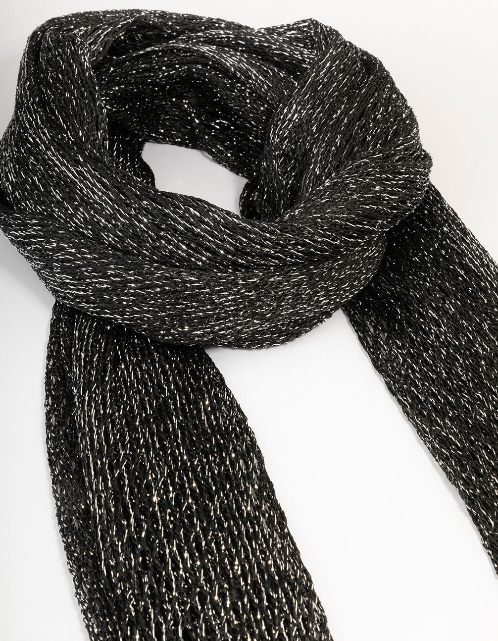 Stylish black fabric drape scarf necklace with tassel accents in solid side view