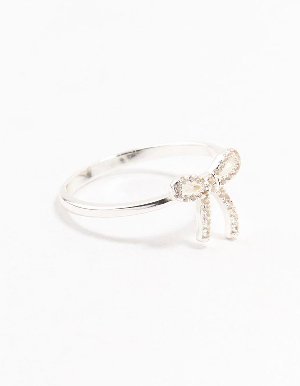 Crafted from sterling silver cubic zirconia bow ring in white side detail view