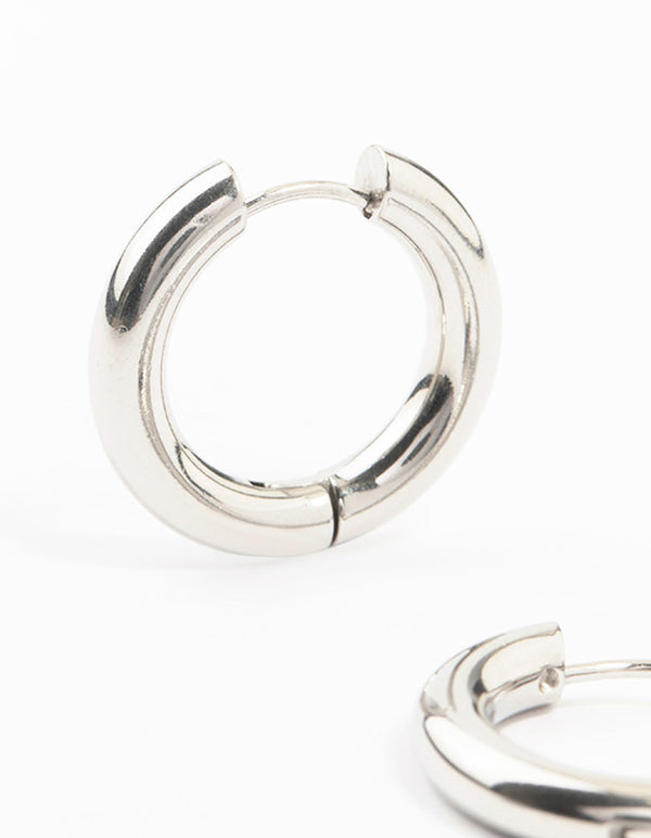 Featuring waterproof stainless steel thick clicker hoop earrings 22 MM in silver close up view