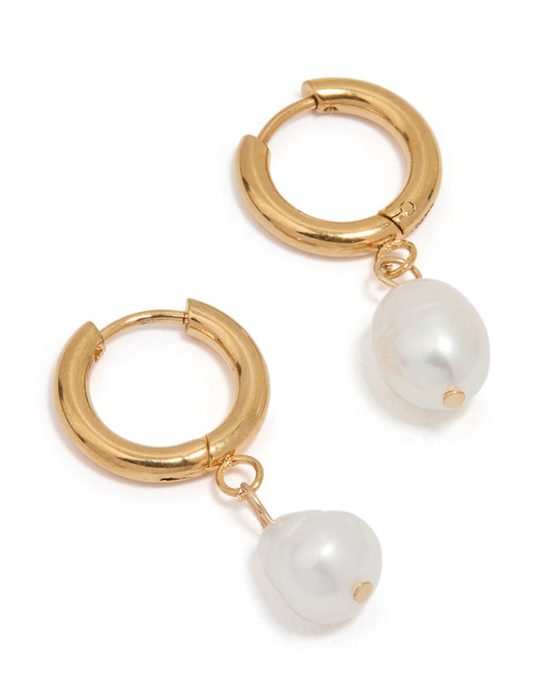 Elegant waterproof gold plated stainless steel freshwater pearl drop huggie earrings in white front view