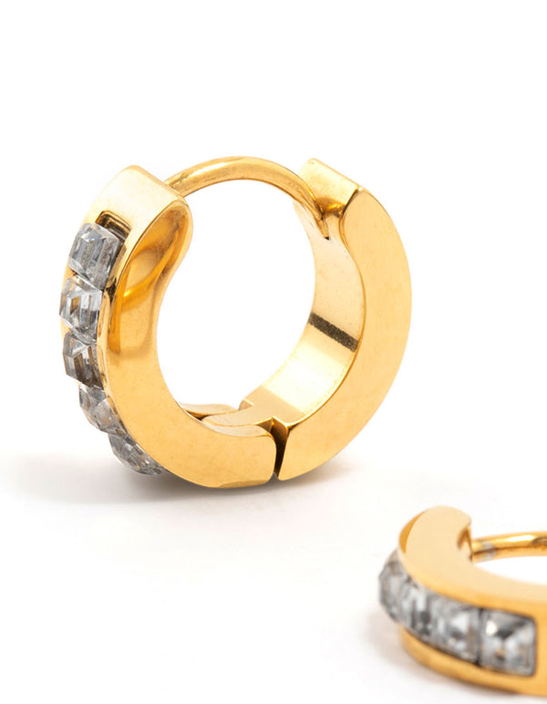 Highlighting waterproof gold plated stainless steel square cut diamante huggie earrings in close up view
