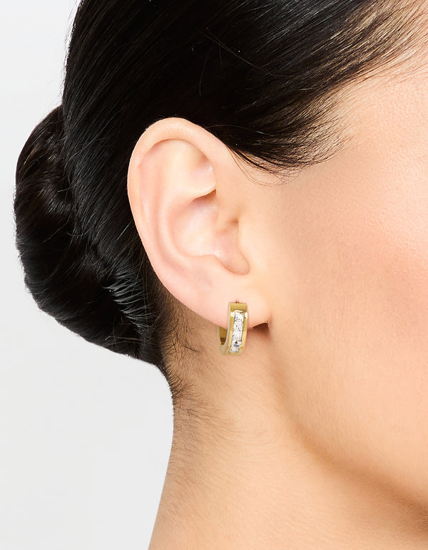 Showcasing waterproof gold plated stainless steel square cut diamante huggie earrings on ear view