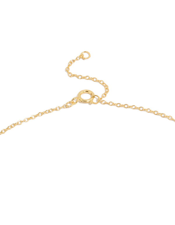 Highlighting a gold plated sterling silver letter S necklace with initials clasp detail view
