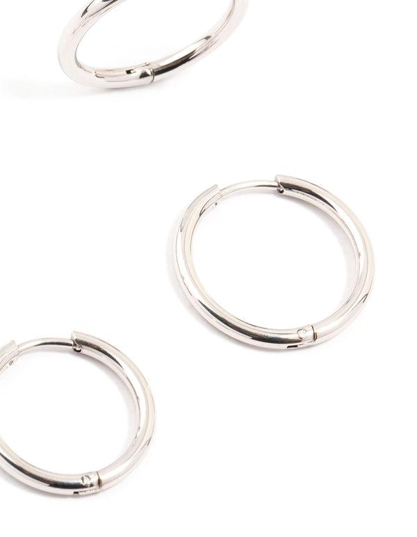 Displaying waterproof stainless steel mini hoop earrings in a 2-pack in silver post detail view