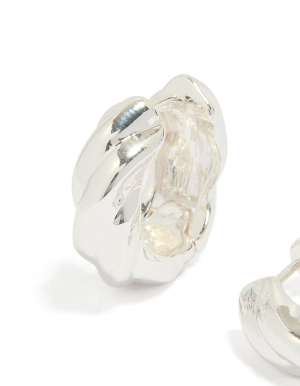 Designed with silver plated twisted hoop earrings in statement finish close up view