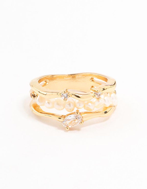 Designed a statement appeal, a gold plated nestled pearl layered ring close up view