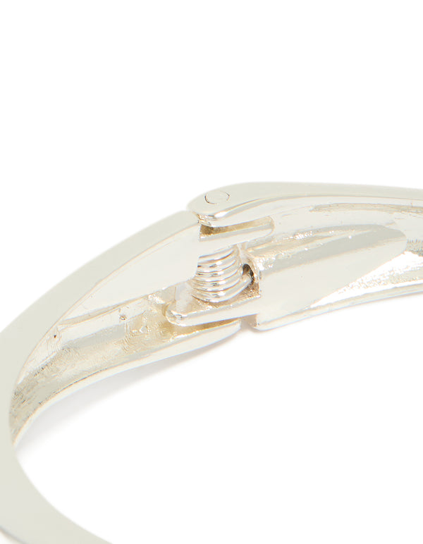 Highlighting the silver plated open hinge wrapped bracelet and closure mechanism closure detail view