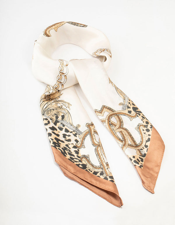 Discover this leopard and chain fabric scarf featuring animal print in ivory, tan, black front view