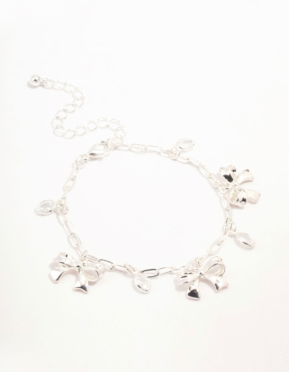Silver Plated Alternating Cubic Zirconia & Bow Charm Bracelet