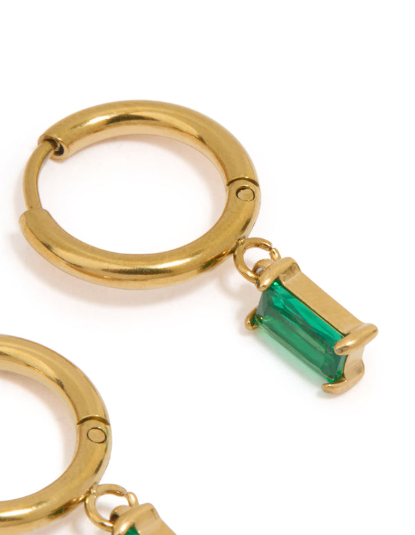 Crafted from waterproof gold plated stainless steel huggie earrings with green baguette stone cut post detail view