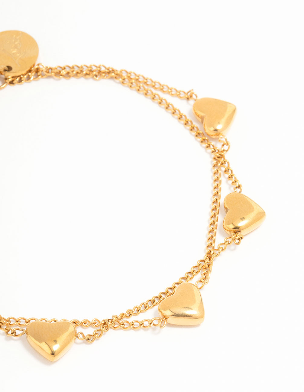 Elegant waterproof gold plated stainless steel heart charm bracelet close up view
