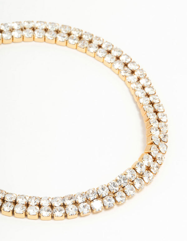 Featuring waterproof gold plated stainless steel diamante layered tennis bracelet close up view