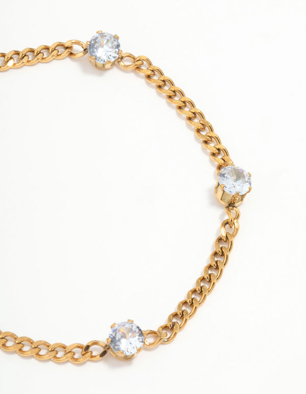 Close view of waterproof gold plated stainless steel station bracelet with cubic zirconia close up view