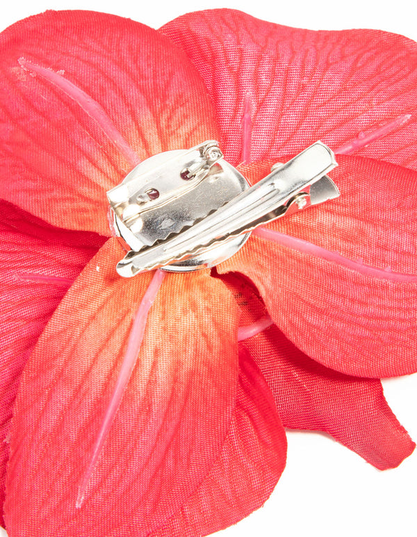 Designed with silver clip closure on pink floral orchid in coral, tomato, and orange shades side view