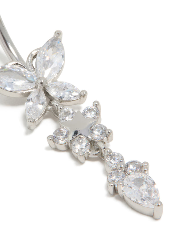 Crafted from surgical steel, this cubic zirconia triple flower belly bar features a butterfly design in clear stone and silver tones, close up view
