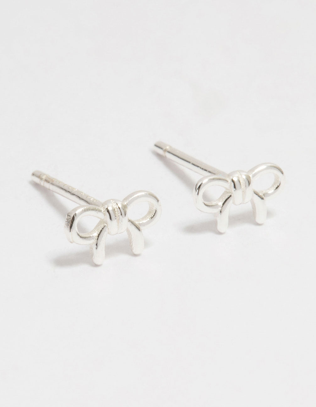 Sterling Silver Mini Clean Bow Stud Earrings