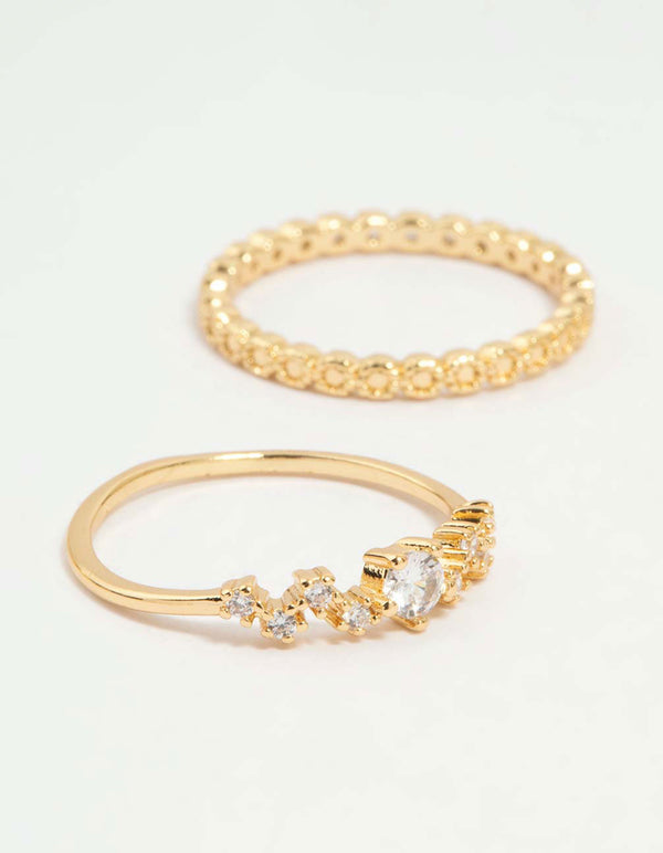 Highlighting gold plated squiggle and rope rings 5-pack with detailed band textures side detail view