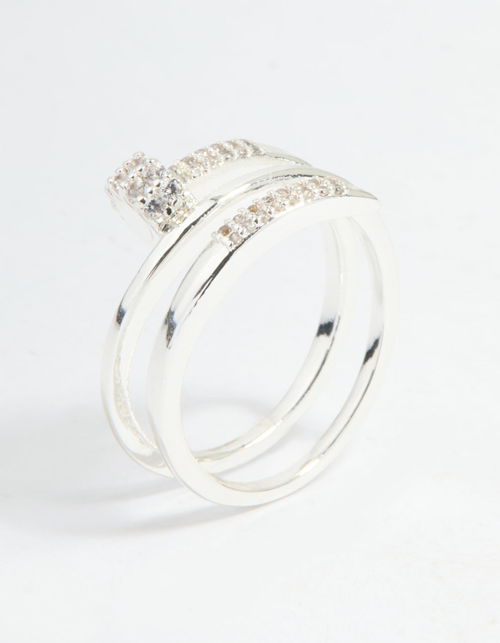 Displaying a statement nail wrap ring crafted from silver plated metal, featuring cubic zirconia stones side detail view
