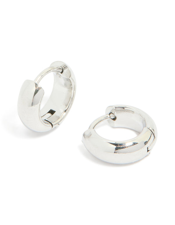 Discover chunky huggie earrings crafted from waterproof stainless steel in silver front view