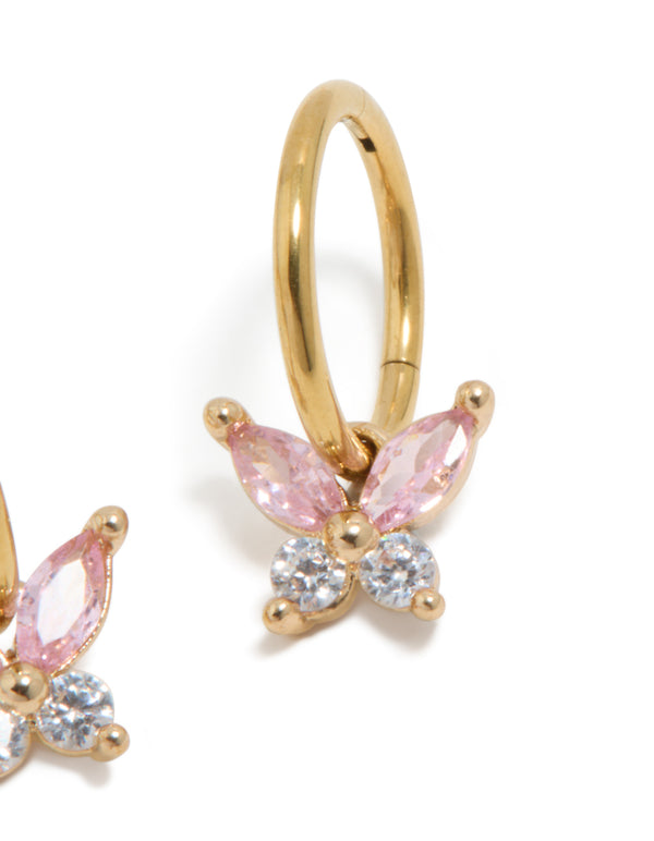 Detailed view of gold plated surgical steel butterfly sleeper earrings featuring pink cubic zirconia post detail view