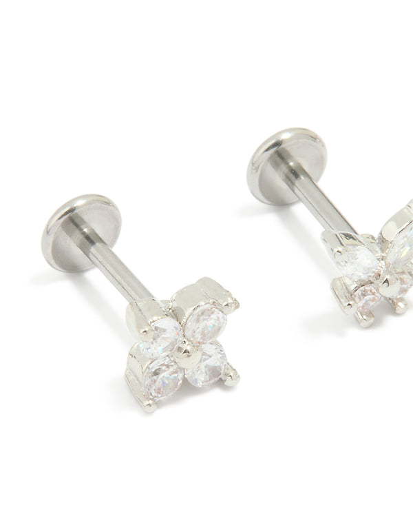 Crafted from surgical steel, these cubic zirconia floral, butterfly flat back studs in a 3-pack feature silver and white detailing close up view