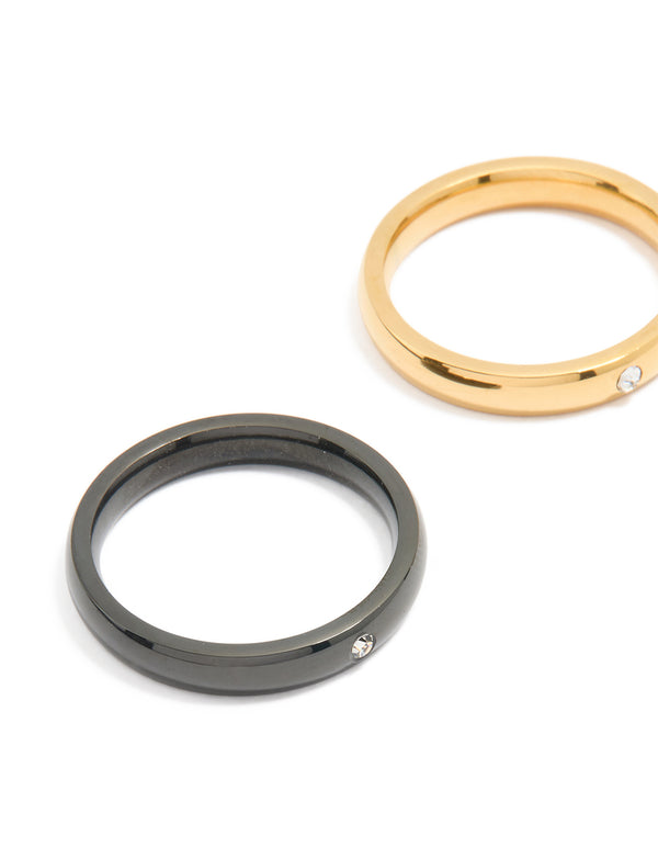 Designed with waterproof mixed stainless steel dainty rings in a 3-pack featuring gold, silver, and black finishes close up view