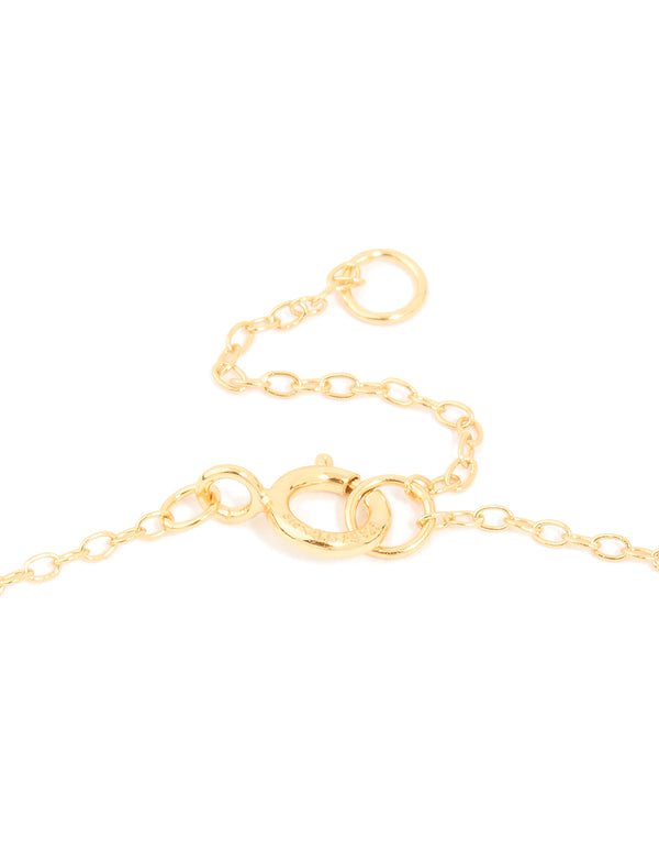 Crafted from gold plated sterling silver, this cubic zirconia pavé letter A necklace features initials and statement design in gold and clear clasp detail view