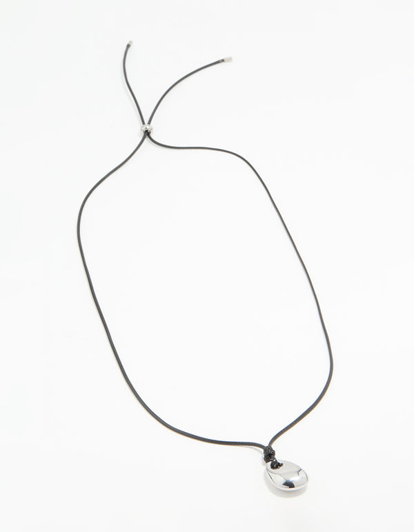 Showcasing a waterproof pendant necklace with stainless steel and black cord front view