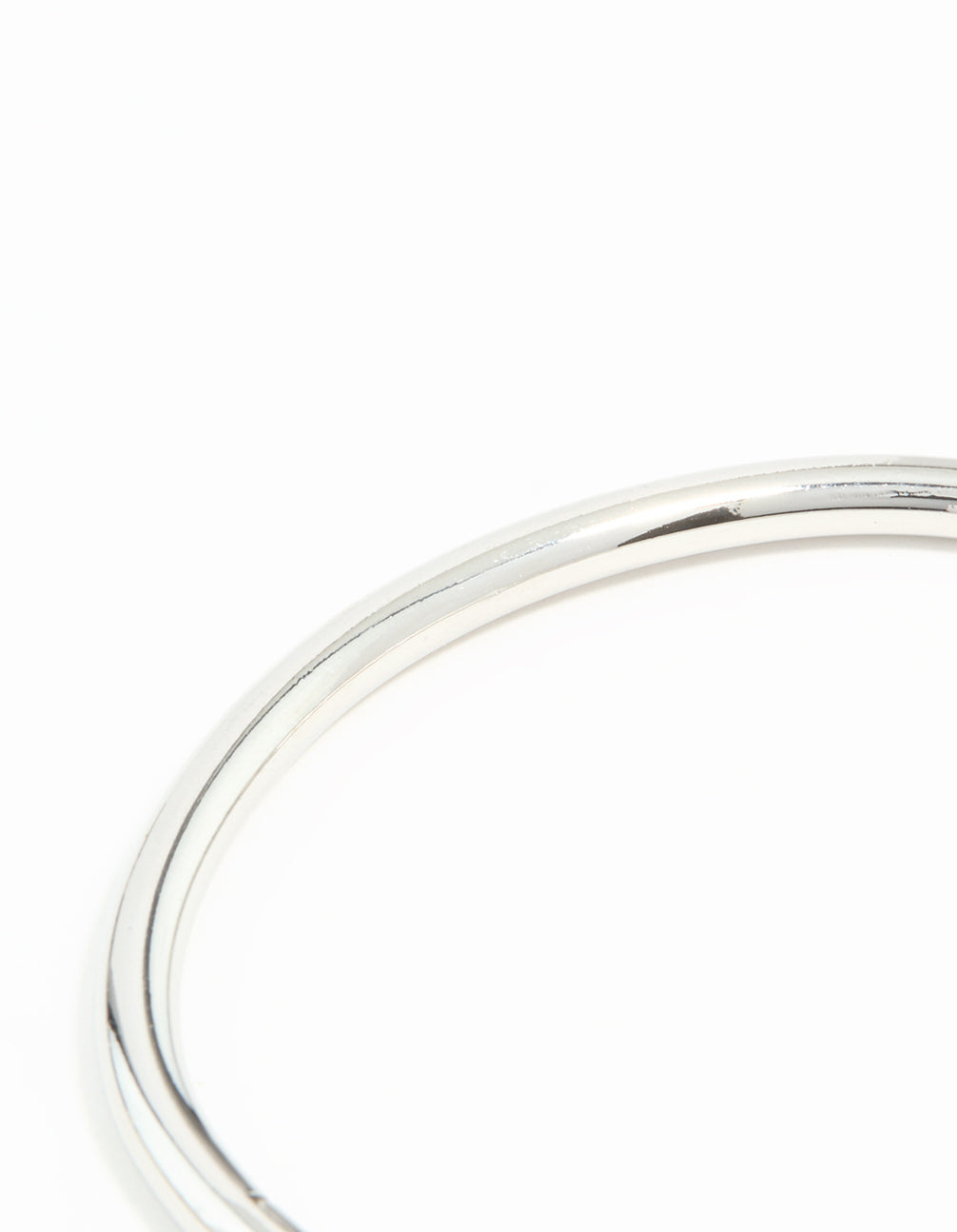 Crafted from waterproof stainless steel simple hinged bangle in silver close up view