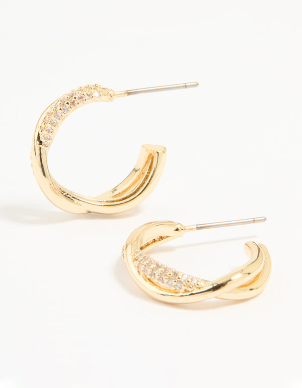 Showcasing statement hoop earrings crafted from gold plated material with cubic zirconia in a twisted design front view