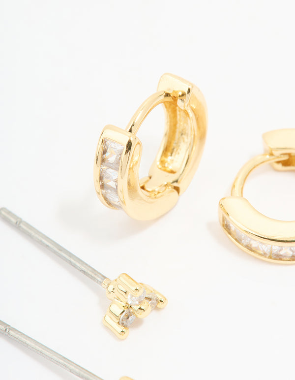 Detailed view of gold plated cubic zirconia stud and huggie earrings in a 2-pack post detail view
