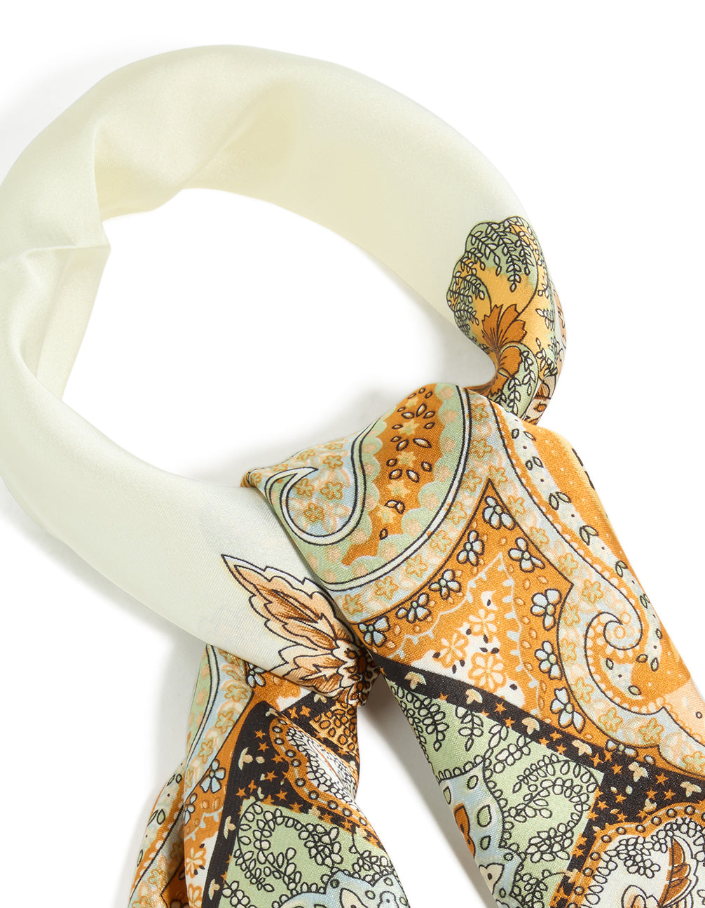 Crafted paisley western fabric scarf with floral and leaf print in ivory, orange, dark sea green, and black detail view