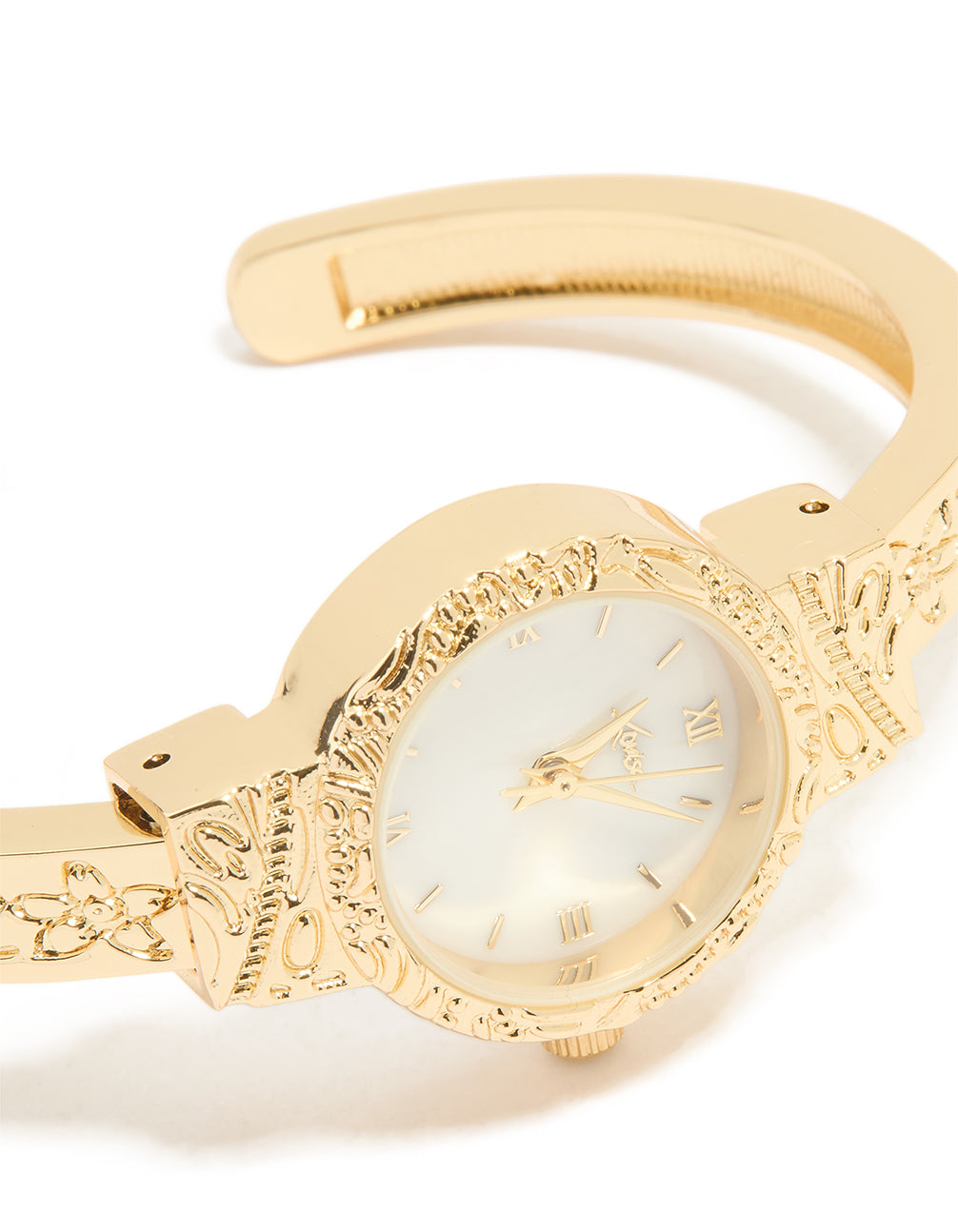 Showcasing a molten vintage cuff watch featuring white dial, roman numerals, round shape, analog type for women in casual occasions watch face detail view