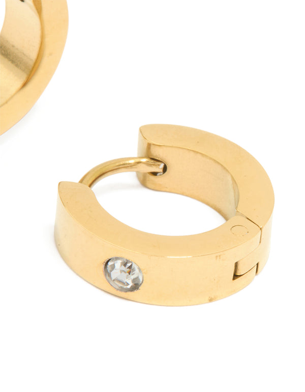 Featuring waterproof gold plated stainless steel cubic zirconia huggie earrings with closure mechanism post detail view