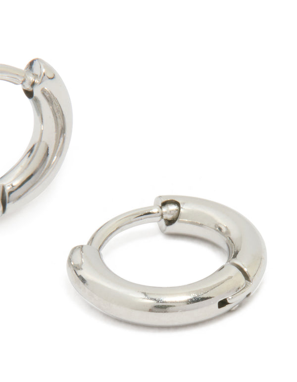 Showcasing waterproof stainless steel clicker hoop earrings in silver post detail view