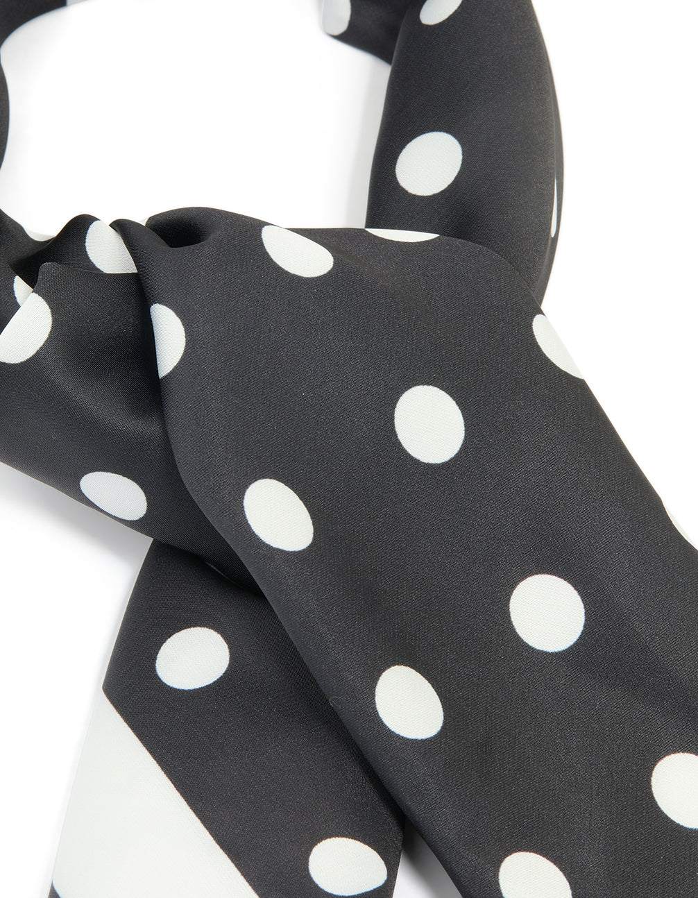 Elegant polka dot fabric scarf in black and white side view