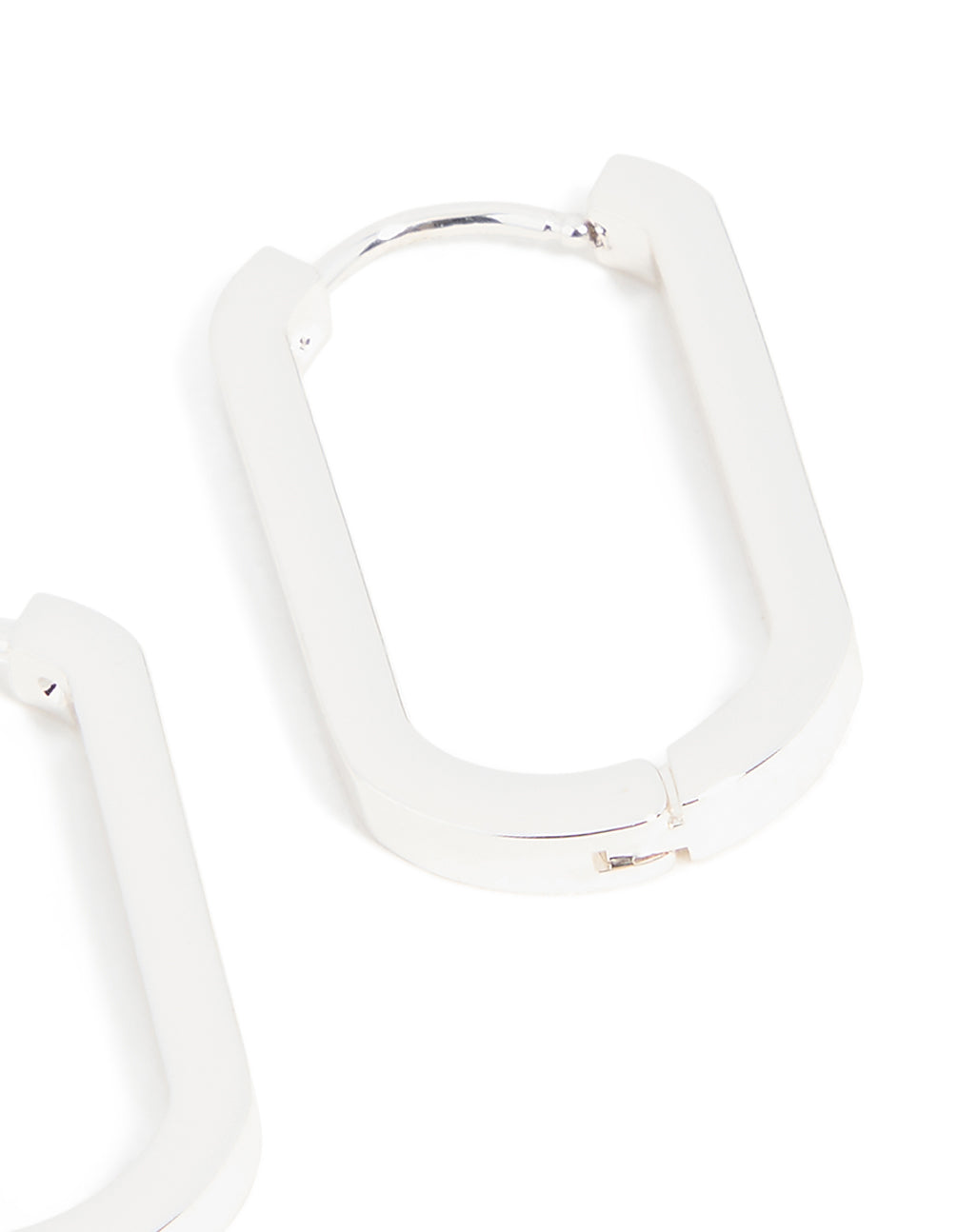 Waterproof stainless steel oblong hoop earrings in silver post detail view
