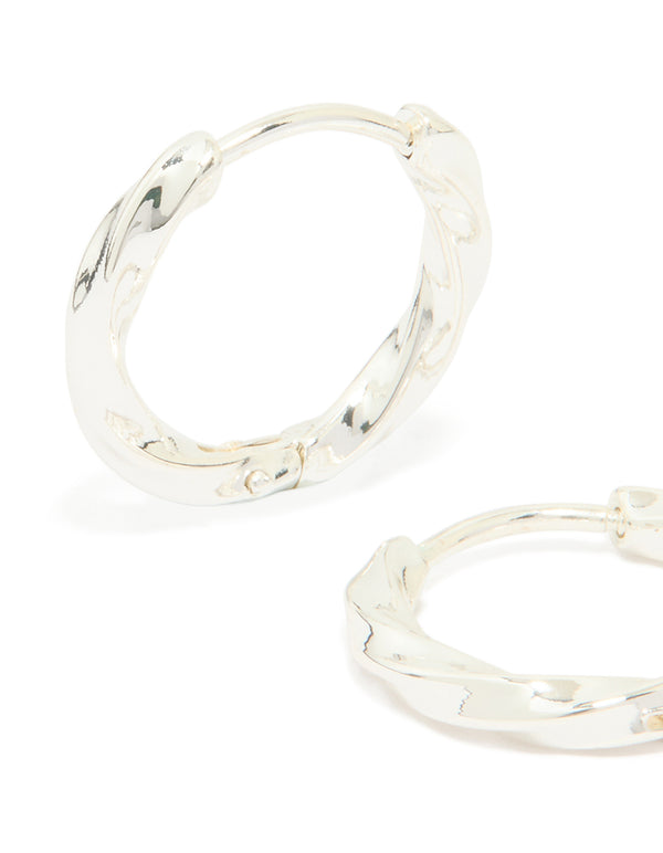 Detailed waterproof stainless steel twisted hoop earrings in silver close up view