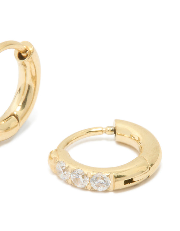 Displaying waterproof gold plated stainless steel cubic zirconia huggie earrings in 10 MM with closure mechanism post detail view