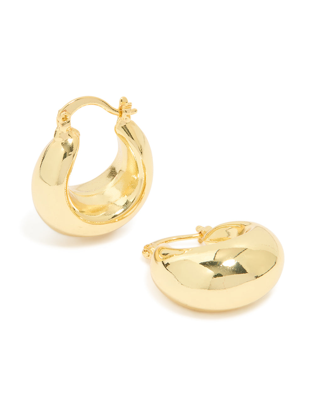 Showcasing gold plated brass medium huggie earrings in a polished finish front view