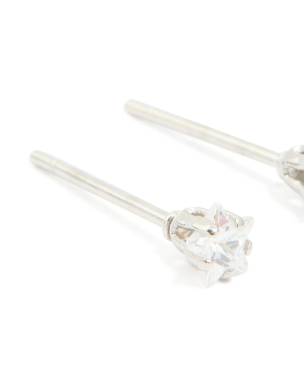 Designed with celestial waterproof stainless steel prism cubic zirconia star stud earrings in 4 MM silver and clear close up view