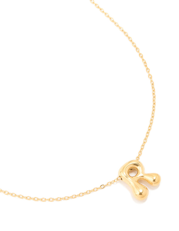 Beautifully crafted waterproof bubble letter R initial pendant necklace in gold plated stainless steel close up view